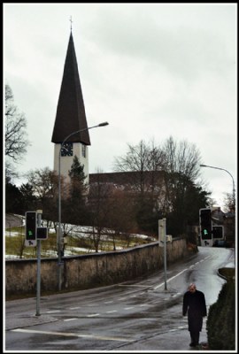 A pedestrian and a church