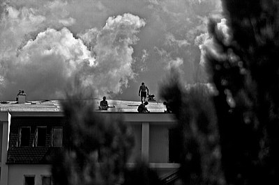 Workers In The Roof
