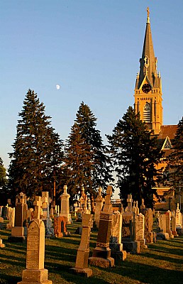 Dying embers on graveyard and steeple
