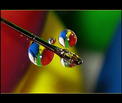 The needle and coloured drops
