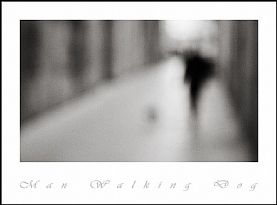 Man Walking Dog in b&w