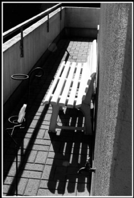 A bench in sunlight