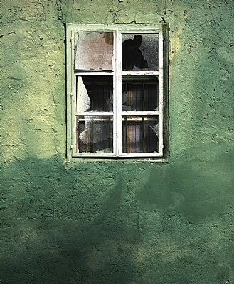 Window on green wall