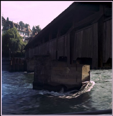 Wooden bridge and running water