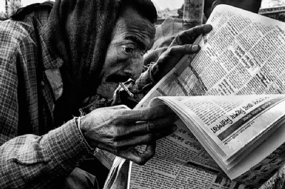 The Newspaper Reader