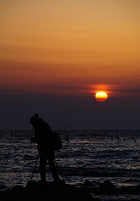 sunset and photographer