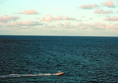 Clouds, Boat & Ocean