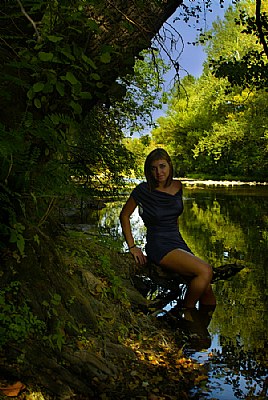 Girl on the riverbank