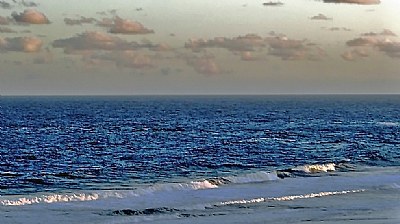 Ocean & Distant Clouds