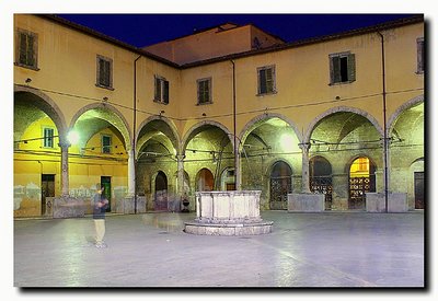 People in the cloister at night