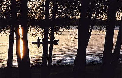 Canoe At Sunset