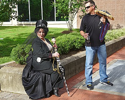 The lady and her man-in-waiting..Charleston WV funeral parade