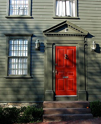Red Door on Green House