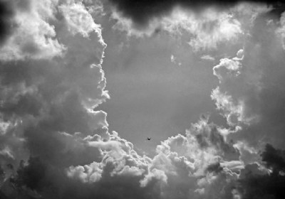 Cloud Opening with Plane