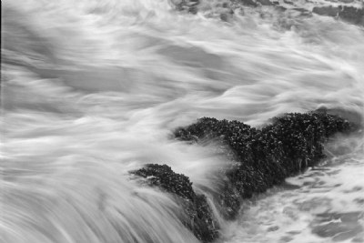 Wave Over Rocks
