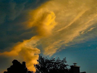 Thunder storm approaching at sunset