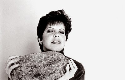 portrait of elizabeth and a rock from the seashore