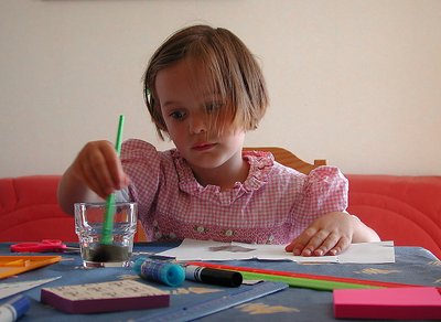 Constance, Young French Artiste, Readies Her Brush...