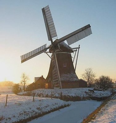 Mill in sunset and out of action