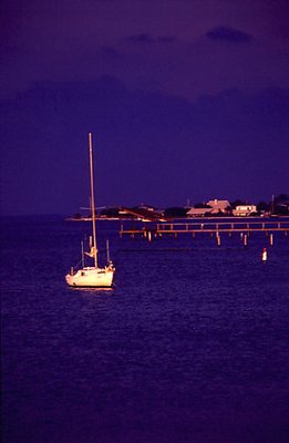 Sail Boat and Fisherman