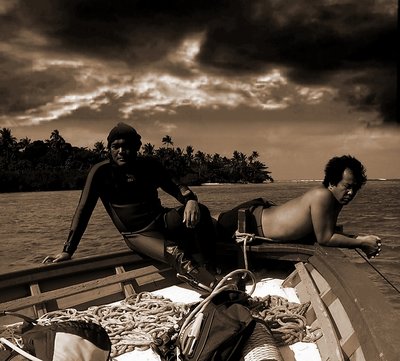 Divers at rest in Sepia