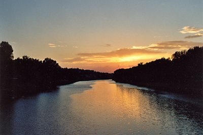 Golden sunset on the river Arno