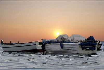 Sunset....behind the boats